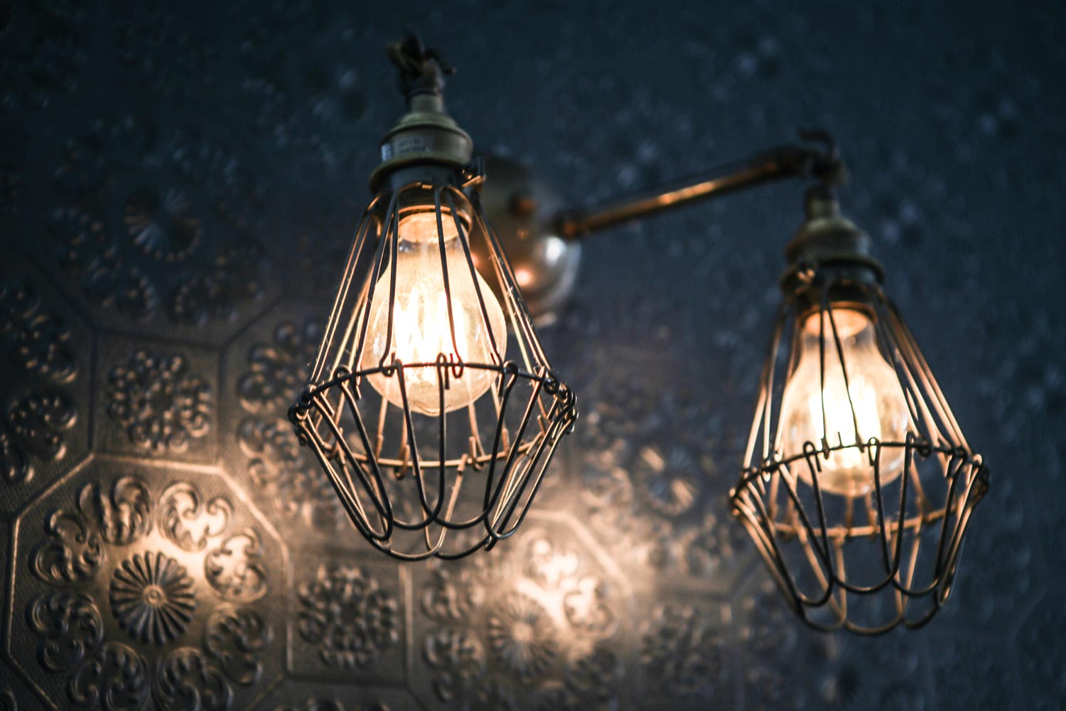 Industrial lighting helps enliven the traditional charm at O'Reilly's Irish pub, Brussels